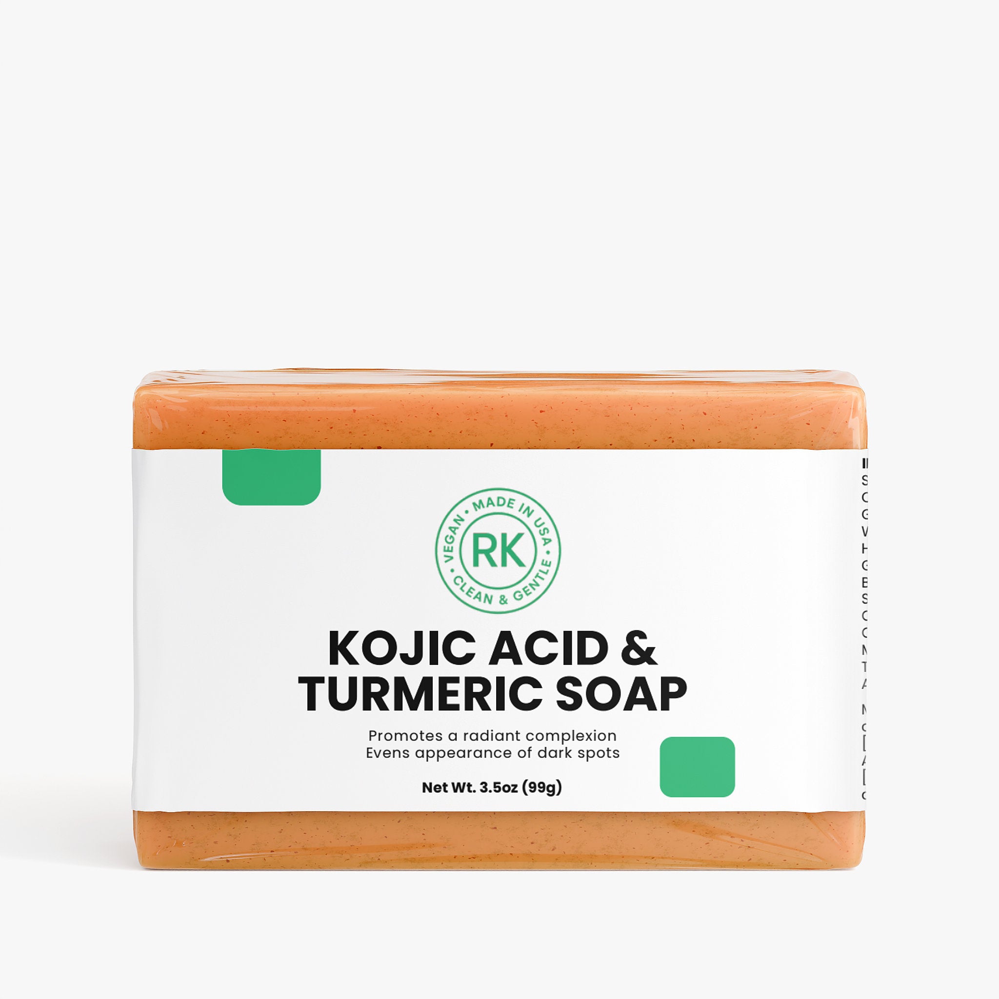 Bar of soap with Kojic Acid and Turmeric on a white background